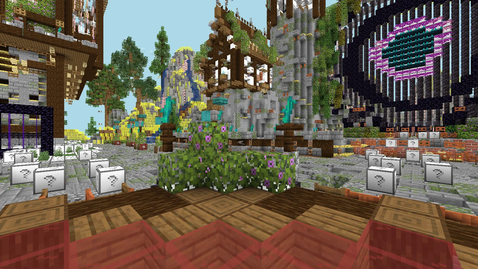 Hub courtyard with the emblem and colorful mountain beyond