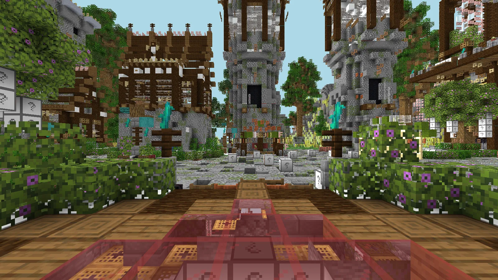 South-facing hub courtyard lined with towers and greenery